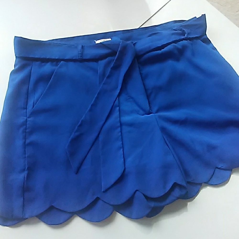 Royal blue shorts with scalloped legs